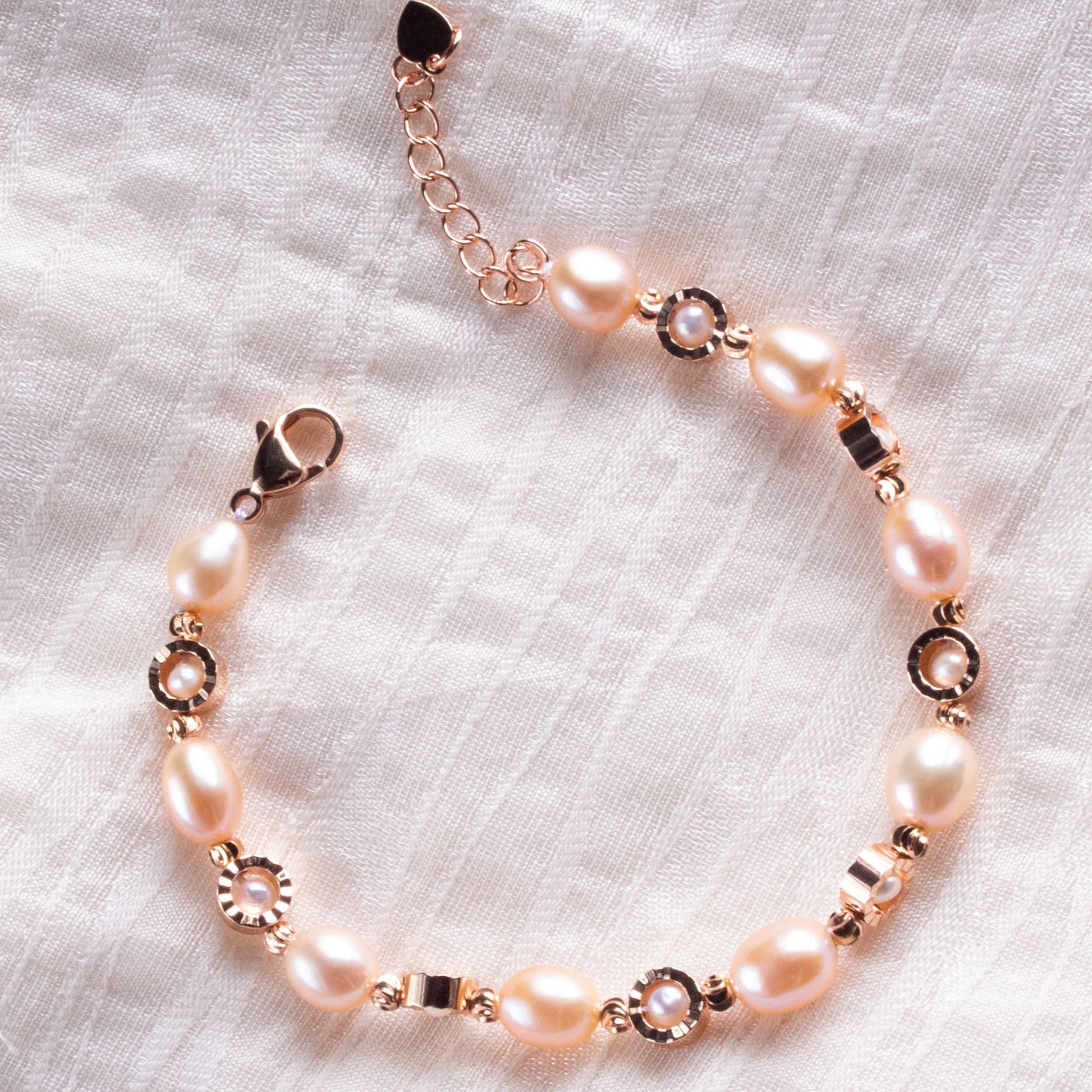 Arbor Trading Post Bracelets Handcrafted Pink Cultured Freshwater Baroque Pearl Bracelet with Rose Gold Finish Chain and Beads, 6mm x 8mm Pearl, 7.5 Inch Long