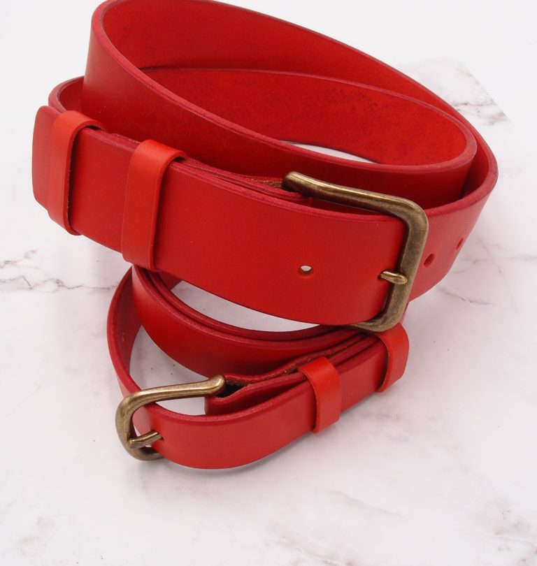 two red leather belts with different sizes