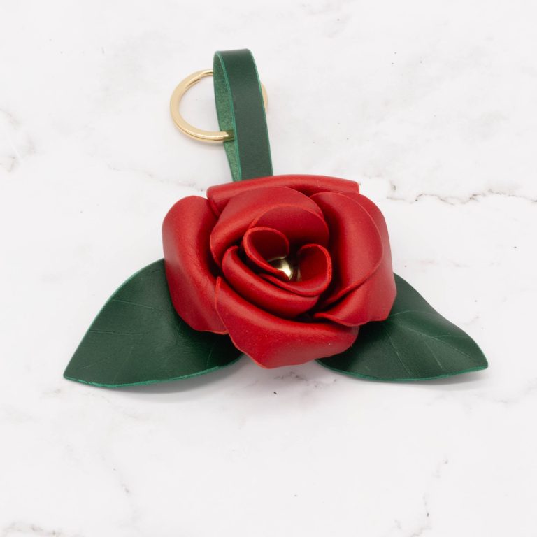 handmade red rose with 2 green leaves and a brass keyring