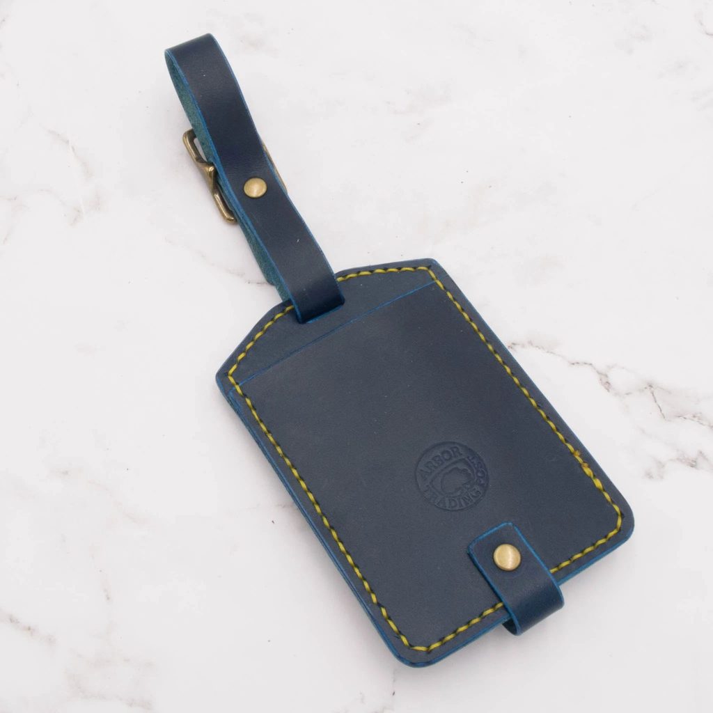 Father's Day Leather Gift Guide: Gifts He'll Actually Use Every Day 43 Arbor Trading Post Luggage Tag Handcrafted Leather Luggage Tag (Choose from 6 colors)