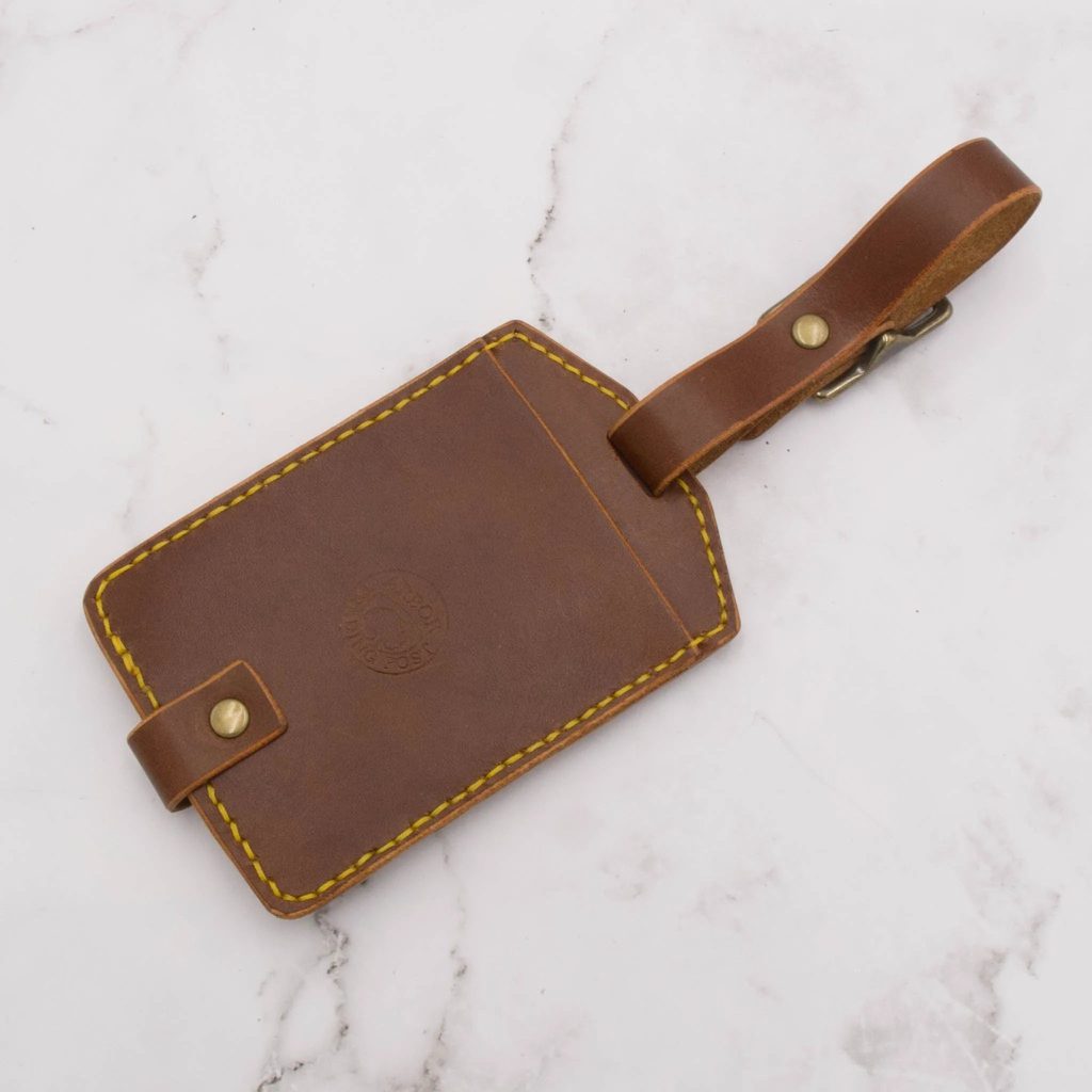 Father's Day Leather Gift Guide: Gifts He'll Actually Use Every Day 39 Arbor Trading Post Luggage Tag Handcrafted Leather Luggage Tag (Choose from 6 colors)